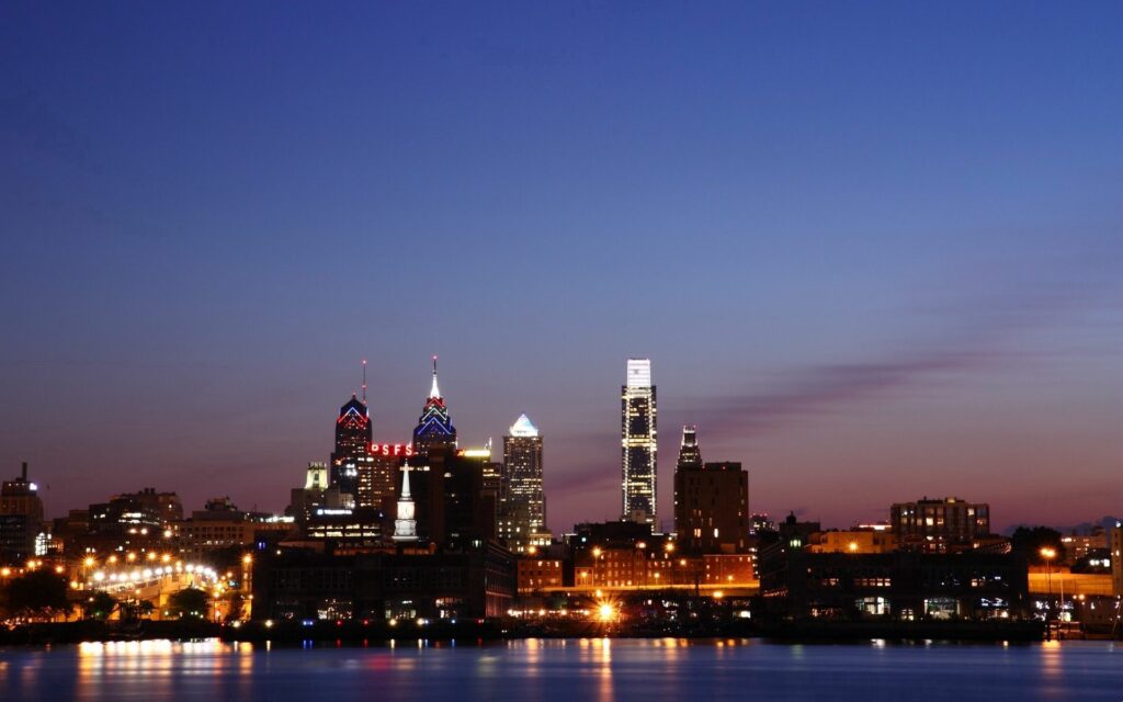 Philadelphia Night Skyline Wallpaper: City Lights & Water Reflection