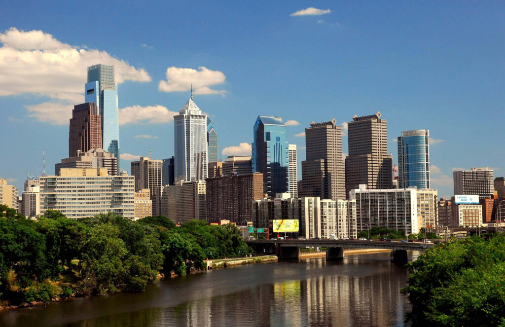 Stunning Philadelphia Skyline Wallpaper: Daytime Reflection & Skyscrapers