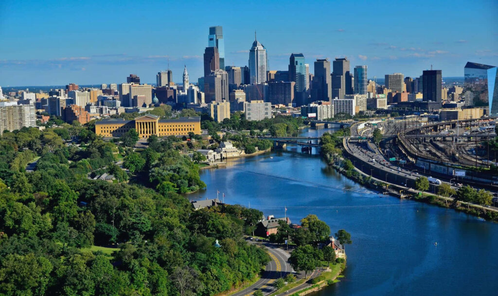 Stunning Philadelphia Skyline Wallpaper with River and Greenery