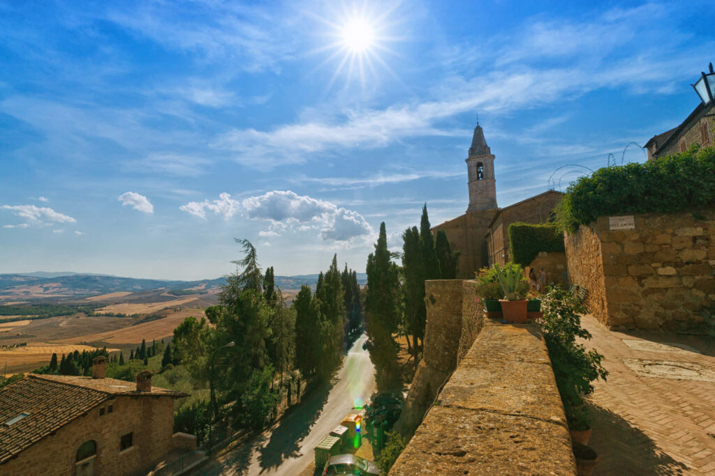 Stunning Pienza Wallpaper: Charming Town & Scenic Blue Sky Background