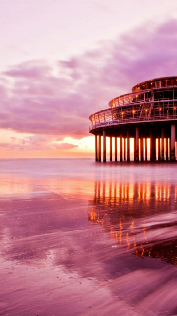 Stunning Hot Pink Sunset Pier Wallpaper – Serene Background Art
