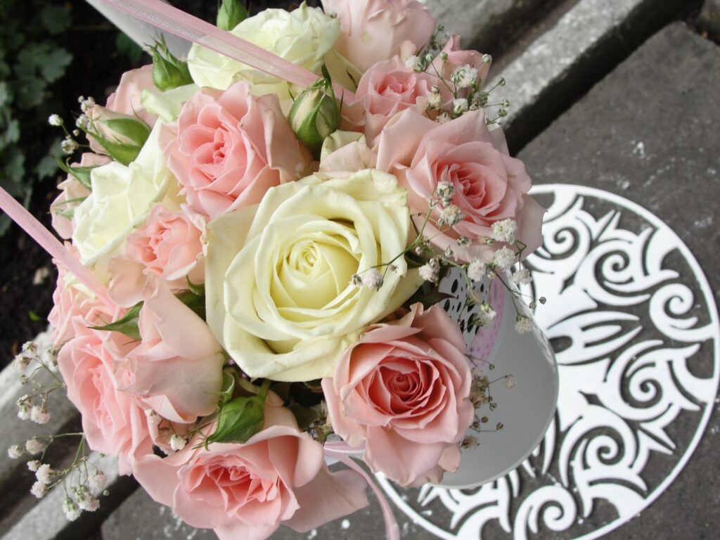 Charming Pink and White Rose Bouquet Wallpaper with Decorative Pot