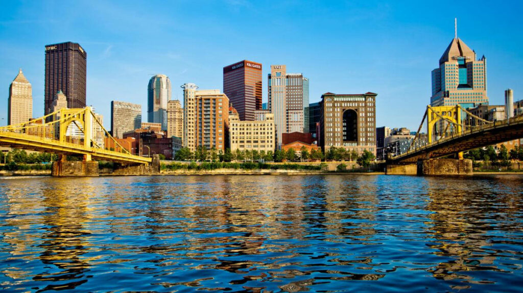Vibrant Pittsburgh Skyline Wallpaper: River Reflection & Iconic Bridges