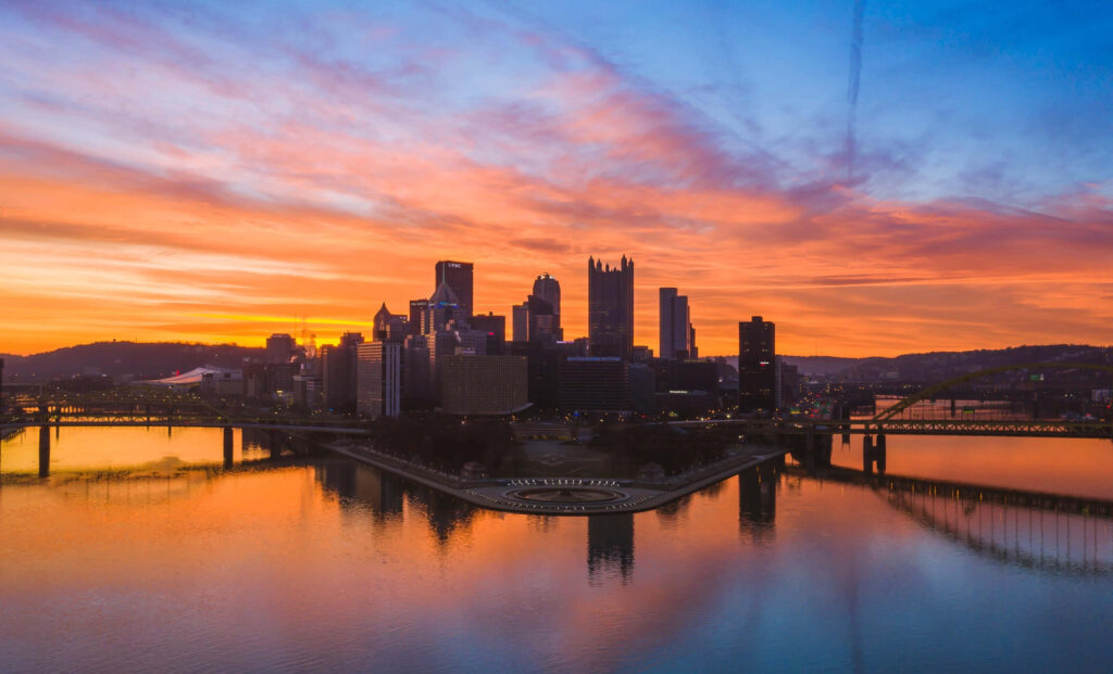 Pittsburgh Skyline Wallpaper: Vibrant Afternoon Reflections