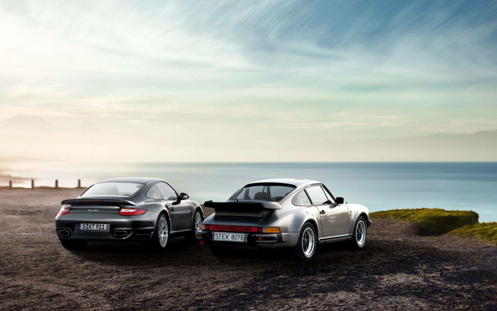 Porsche 911 Evolution Wallpaper: Classic Meets Modern Coastal Beauty