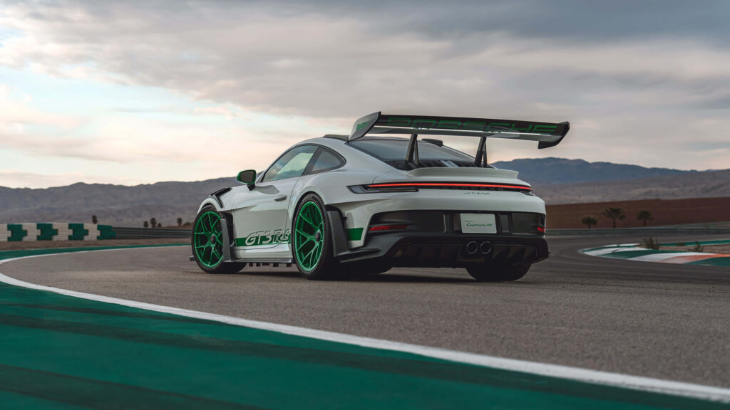 Stunning Porsche 911 GT3 RS Trackside Wallpaper with Scenic Backdrop