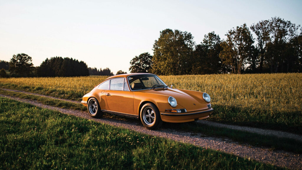 Stunning Porsche 911 Wallpaper in Serene Rural Landscape