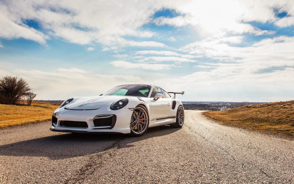 Porsche 991 V-RT Wallpaper: Sleek Design in Serene Landscape Background