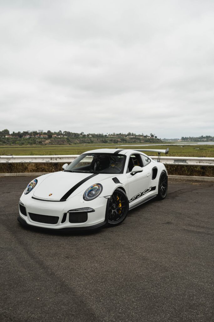 Stunning Porsche GT3 RS Wallpaper: Sleek Design & Outdoor Setting