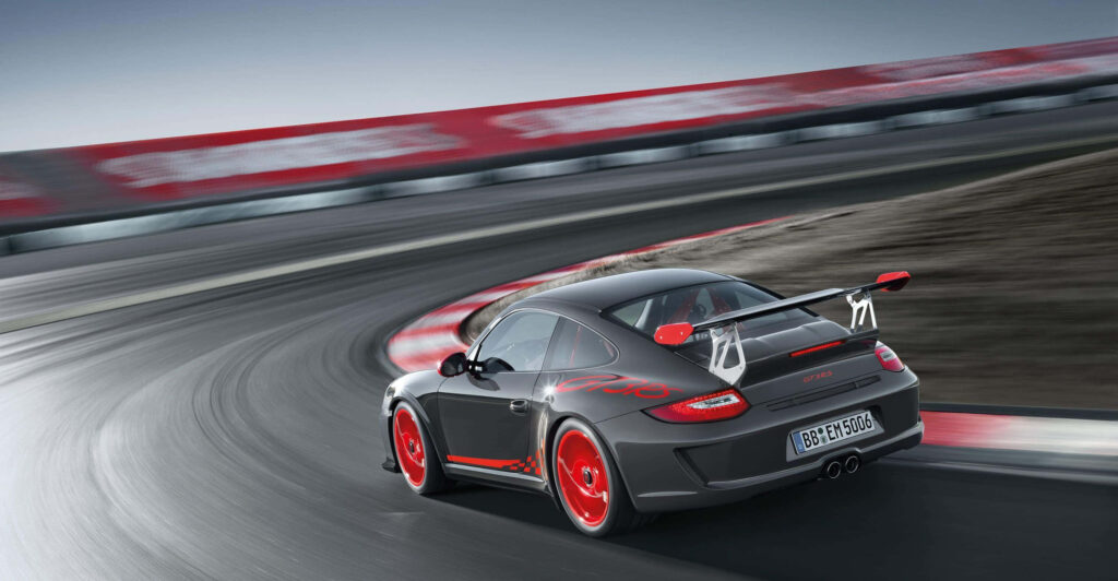 Stunning Porsche GT3 RS Wallpaper: Speed & Design on the Racetrack