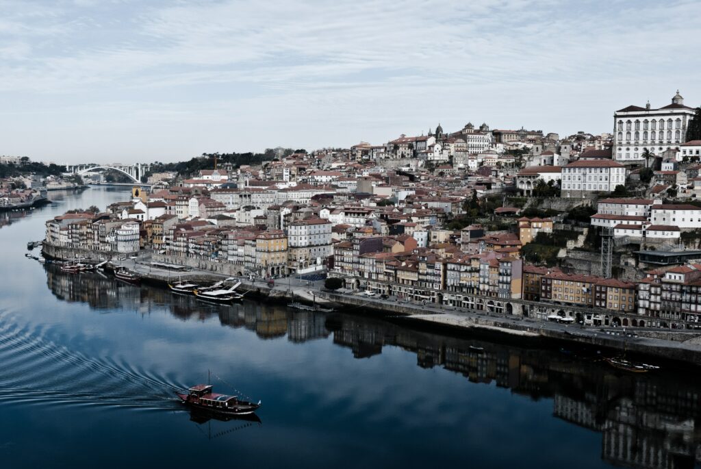 Charming Porto Wallpaper: Historic Buildings & Douro River Serenity