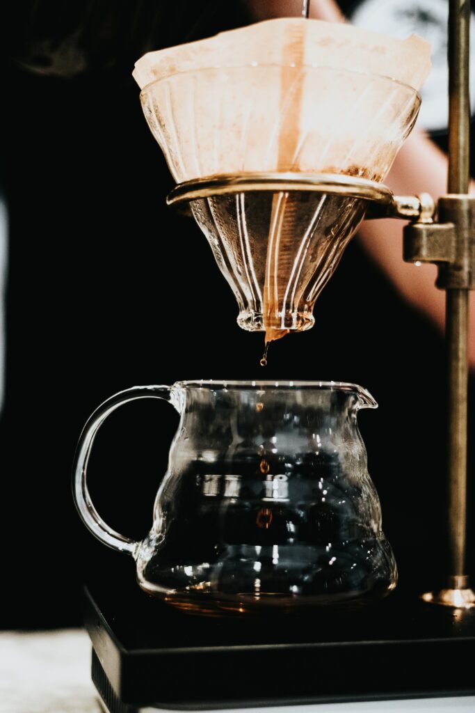 Stunning Pour-Over Coffee Scene in Clear Carafe – Wallpaper Background