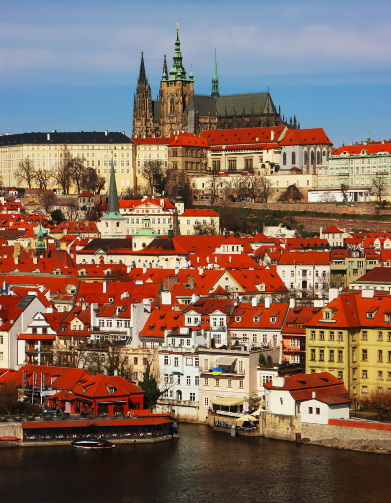 Stunning Prague Wallpaper: Iconic Castle & Vibrant Rooftops View