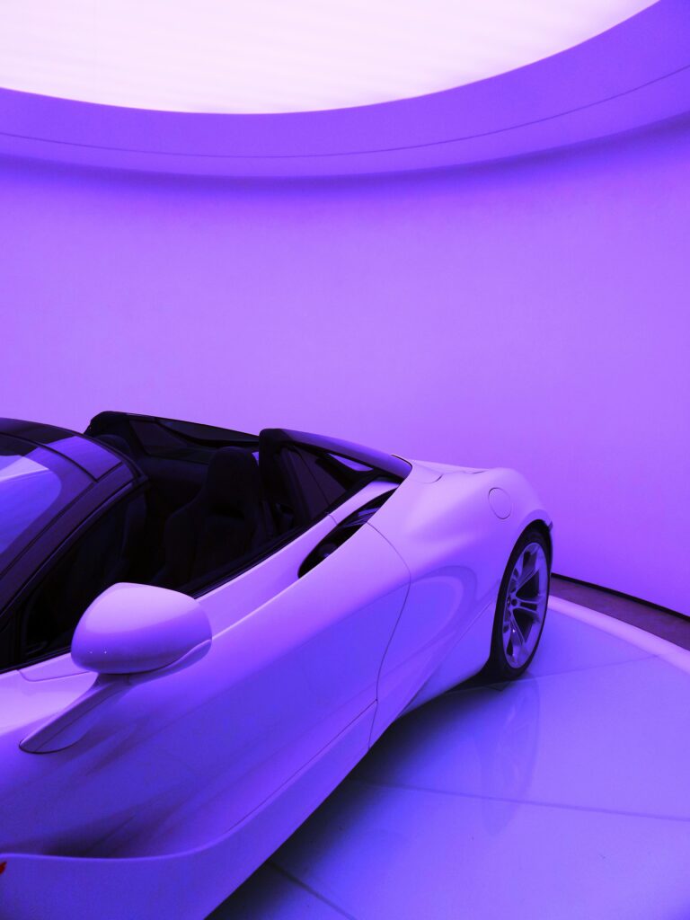 Futuristic Purple Convertible Sports Car Wallpaper - Elegant Design