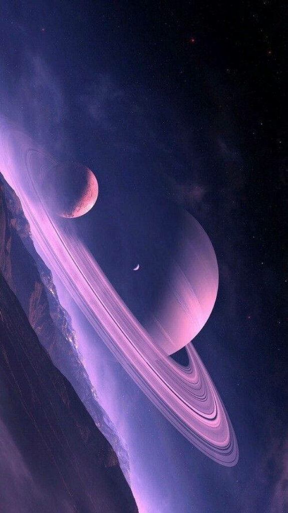 Vibrant Purple Galaxy iPhone Wallpaper with Ringed Planet & Moon