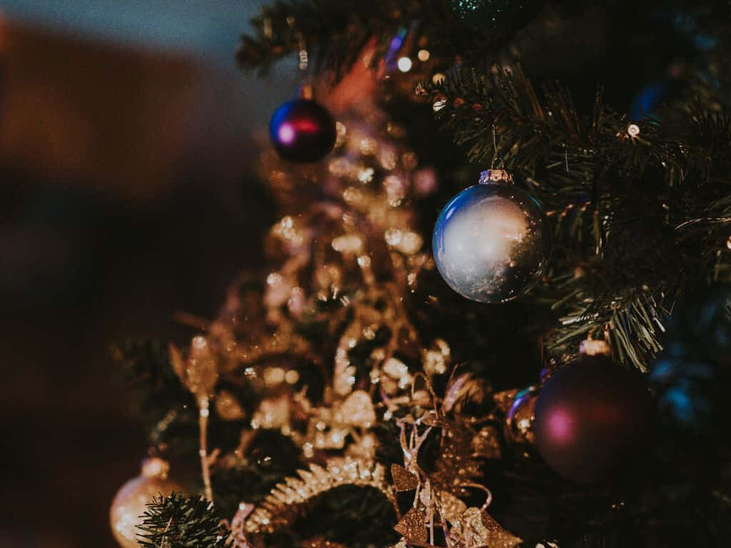 Elegant Purple & Silver Christmas Tree: Perfect Festive Background Wallpaper