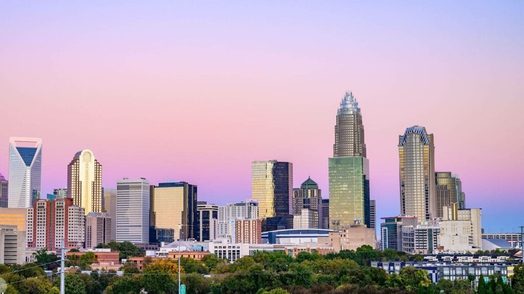 Vibrant Purple Sky Wallpaper: Durham Cityscape & Modern Skyscrapers