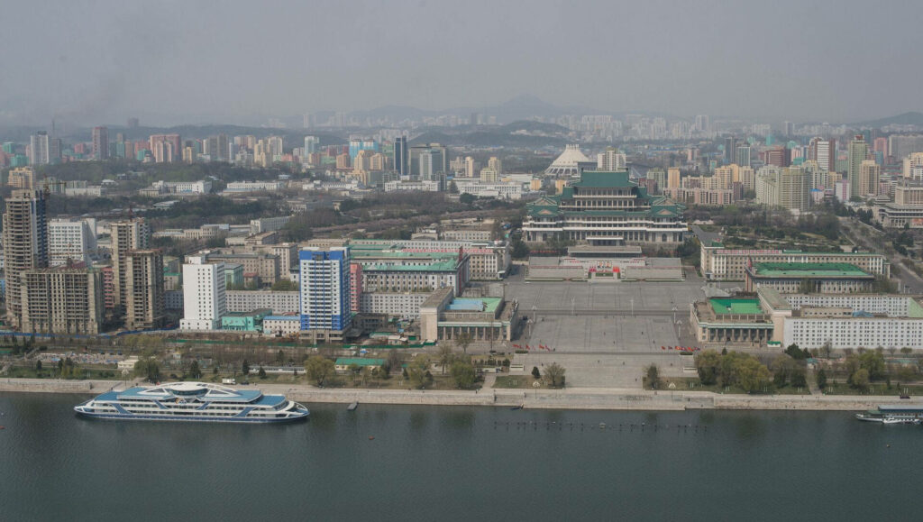 Majestic Pyongyang Skyline Wallpaper: Architectural Landmarks & Blue Sky