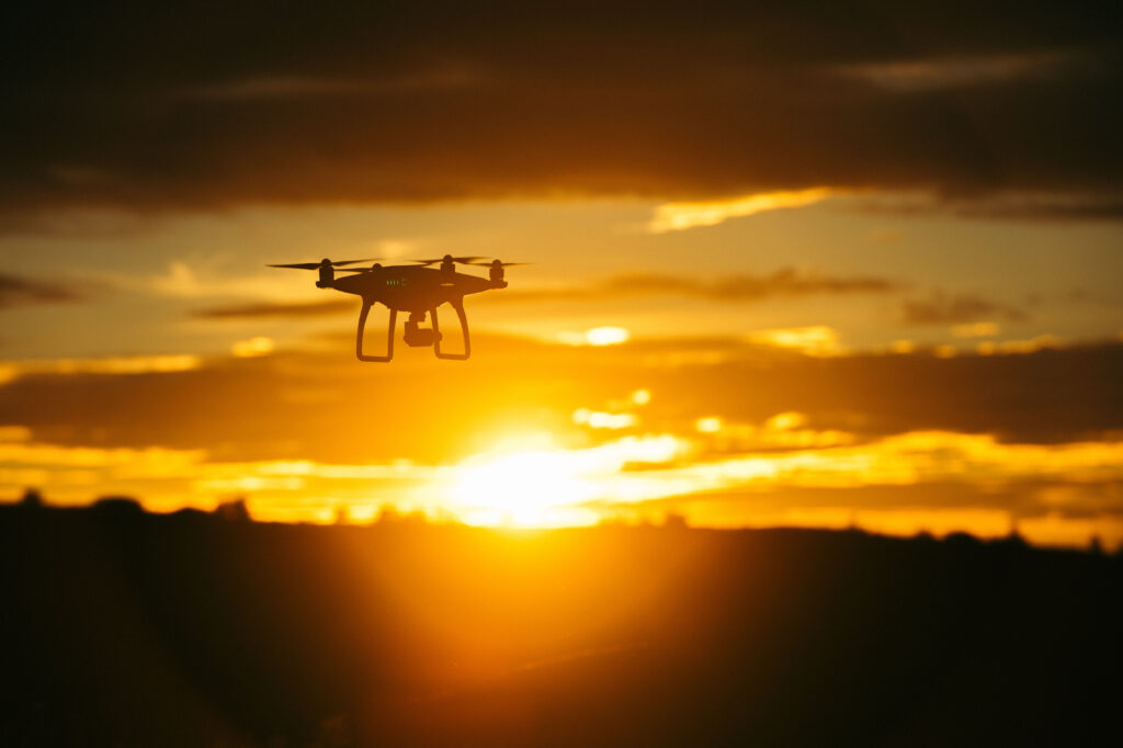 Vibrant Sunset Sky Quadcopter Drone Wallpaper Background