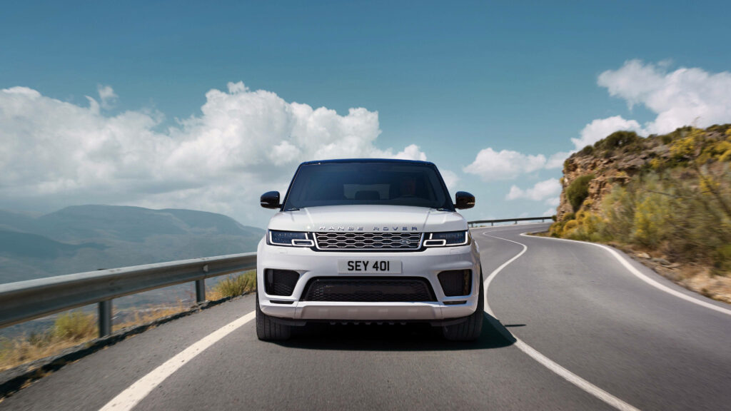 Elegant Range Rover Sport Wallpaper: Adventure on Scenic Roads