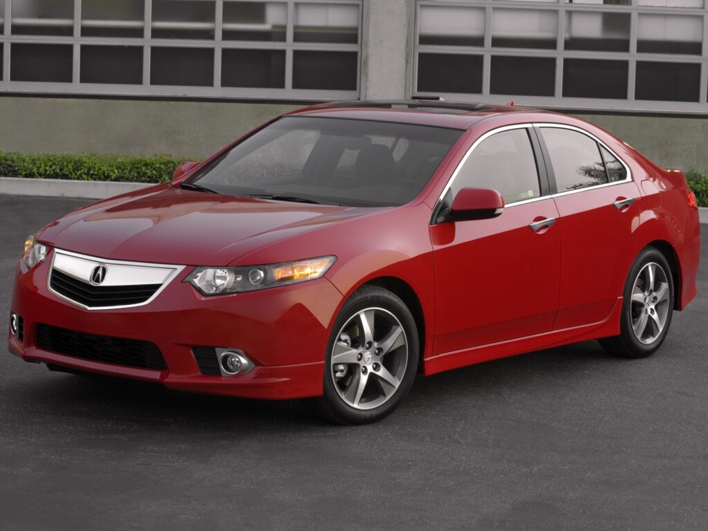 Stunning Red 2011 Acura TSX Wallpaper in Urban Landscape