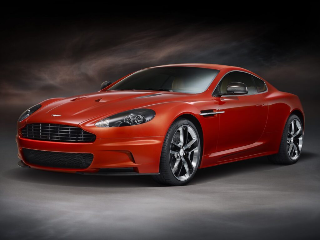 Elegant 2011 Aston Martin DBS Wallpaper: Side View on Dark Background