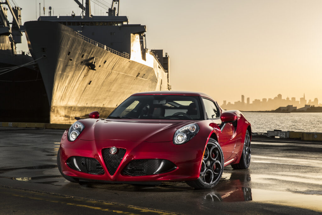 Stunning Red 2015 Alfa Romeo 4C Sports Car Wallpaper at Sunset