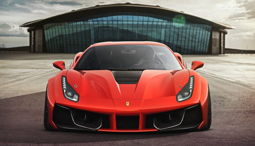 Stunning Red 2015 Ferrari 488 GTB Front View Wallpaper with Modern Background