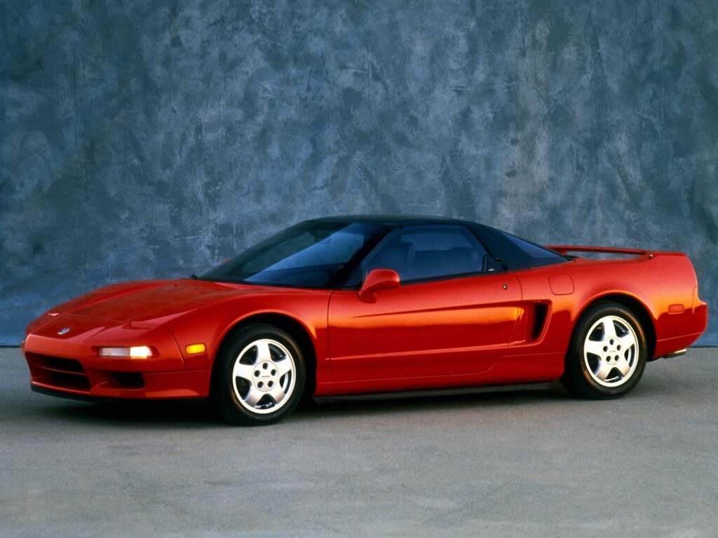 Striking Red Acura NSX Wallpaper: Sleek Side View Design