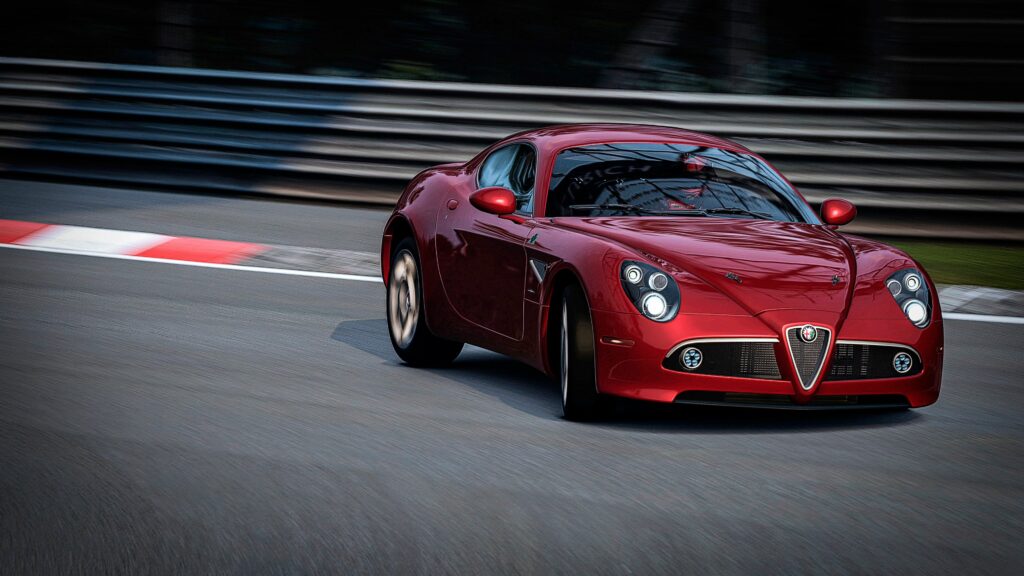 Stunning Red Alfa Romeo Wallpaper - Elegance on the Racetrack