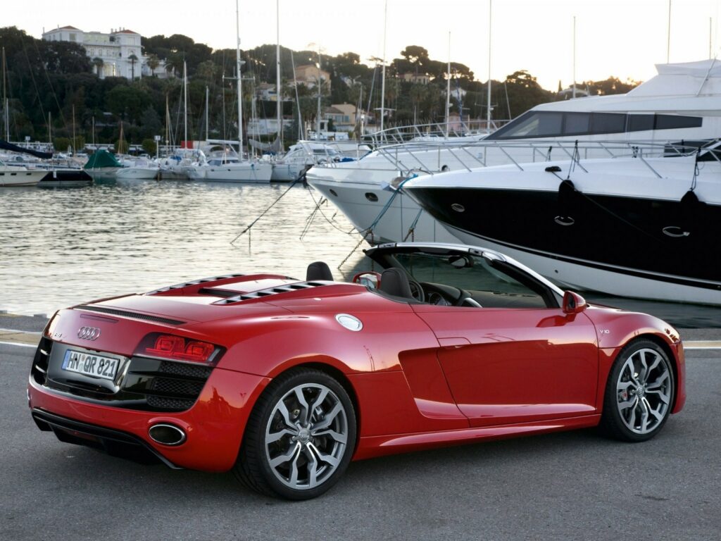 Red Audi R8 Spyder Convertible at Picturesque Marina Wallpaper