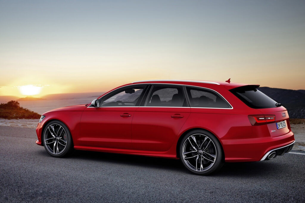 Red Audi RS6 Avant: Sleek Design & V8 Power at Sunset Wallpaper