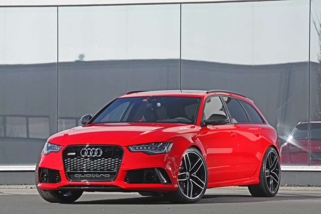 Stunning Red Audi RS6 Wallpaper: Sleek Design in Urban Setting
