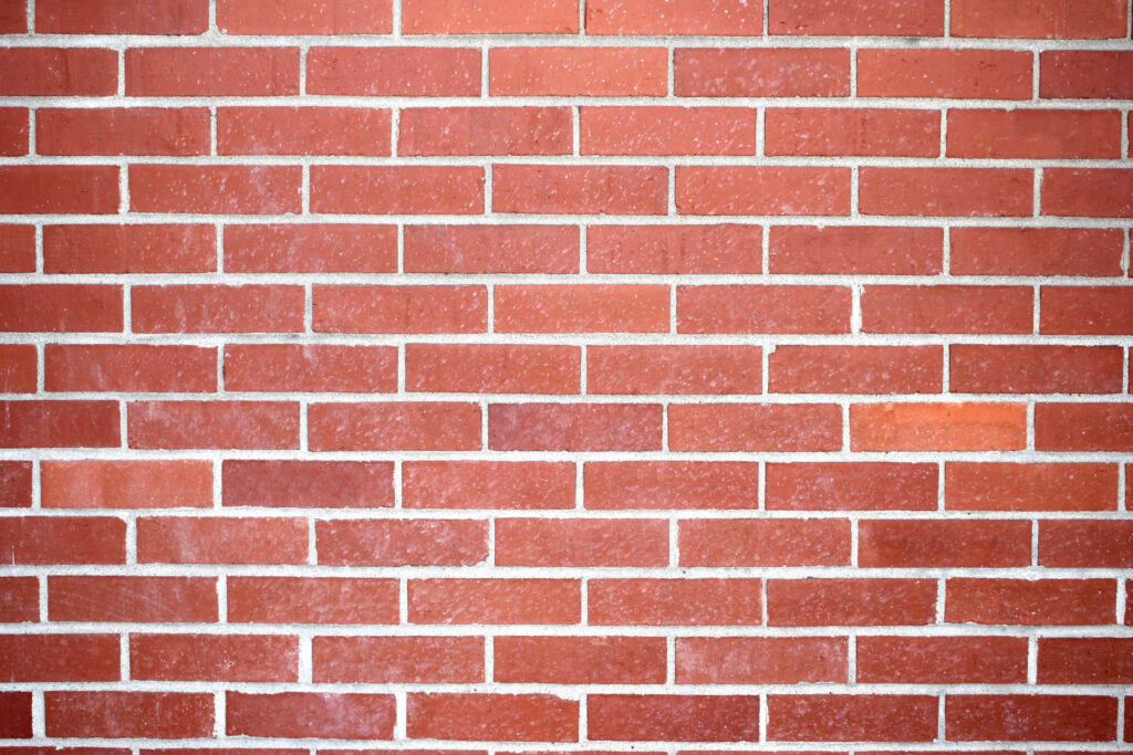 Uniform Red Brick Wall Wallpaper: Clean Texture & Perfect Alignment