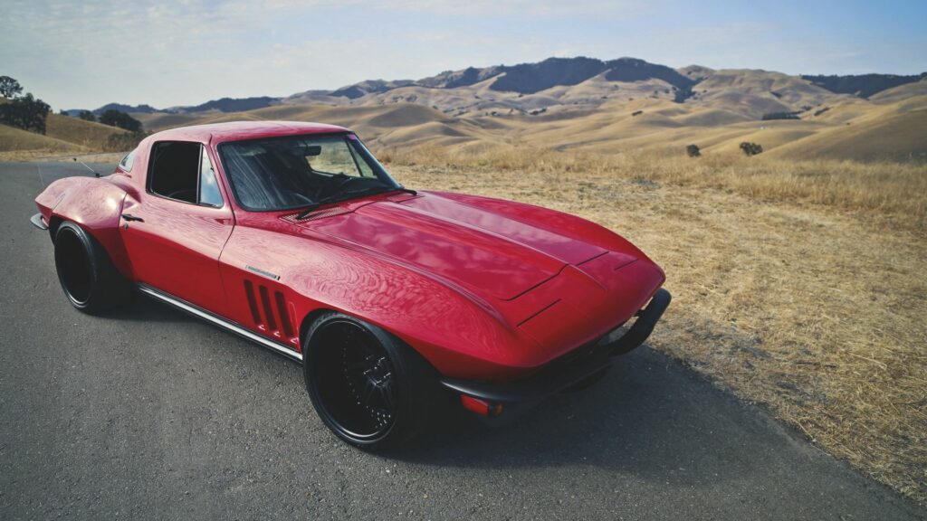 Classic Red Corvette C2 Restomod Wallpaper - Sleek Side View Landscape