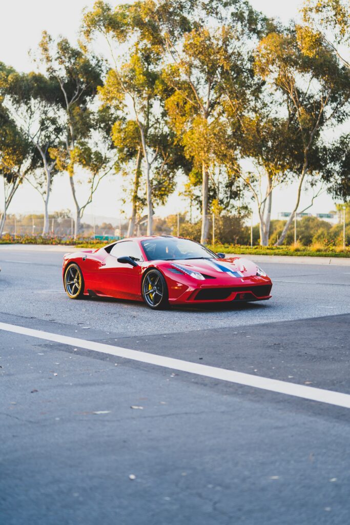Stunning Red Ferrari 458 Italia Wallpaper with Scenic Background
