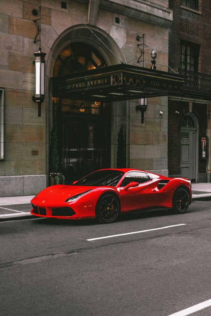 Stunning Red Ferrari 458 Wallpaper - Sleek Urban Side View