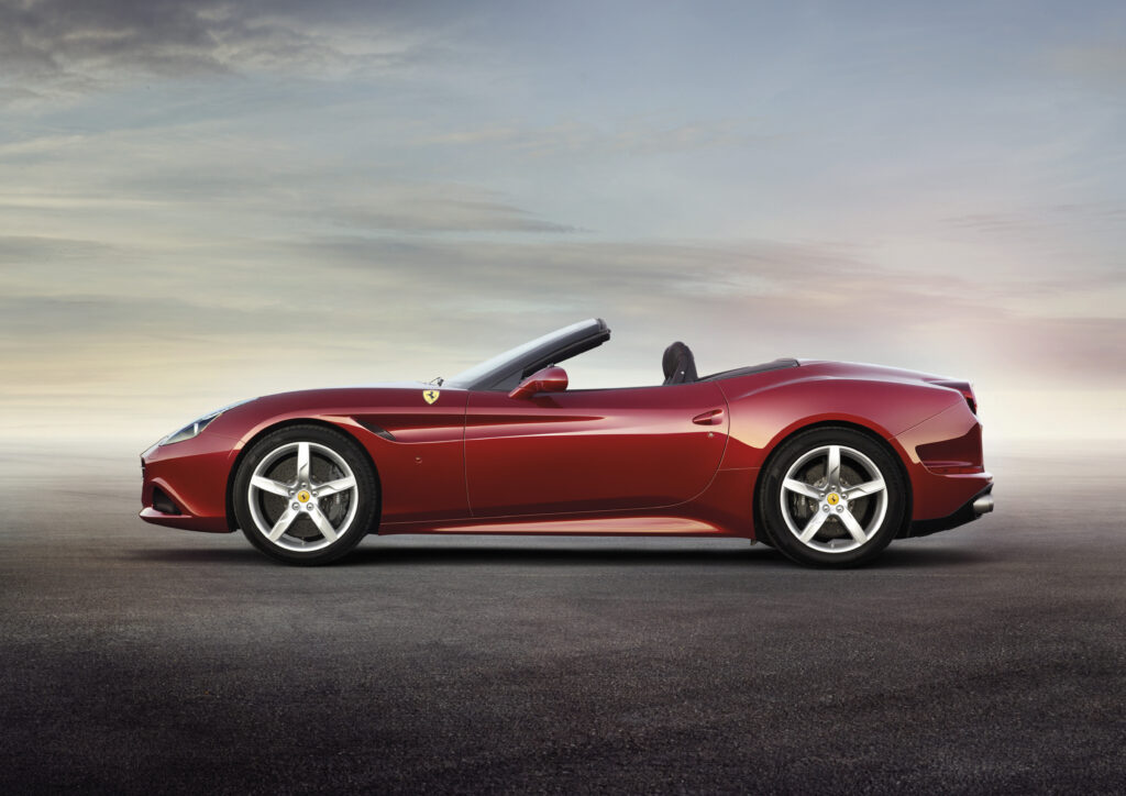 Elegant Red Ferrari California T Wallpaper on Serene Background
