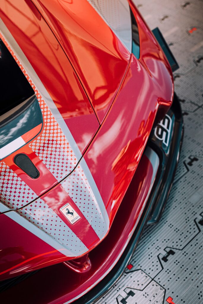 Stunning Red Ferrari Sportscar Wallpaper: Luxury & Performance