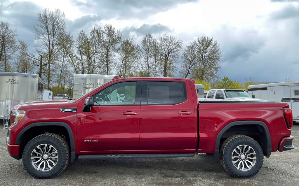 Epic Red GMC Sierra Truck Wallpaper for Adventurers and Truck Lovers