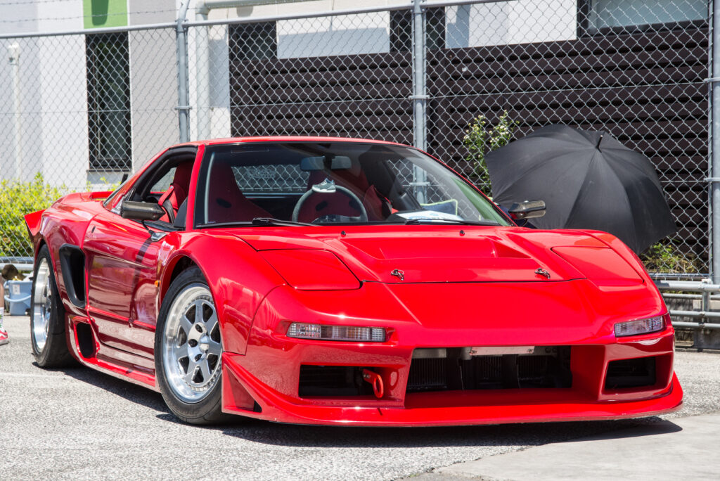 Vibrant Red Honda NSX Wallpaper: Sleek Design & Sporty Features