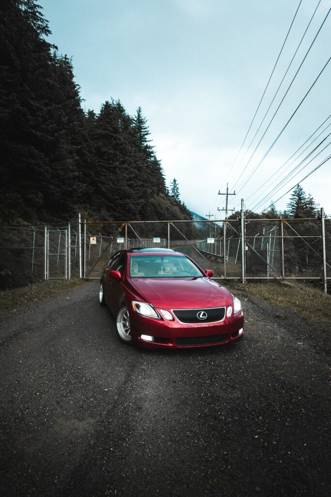 Red Lexus Car Wallpaper: Stunning Mountainous Backdrop