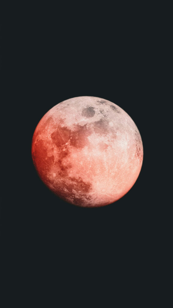 Vivid Red Lunar Eclipse Wallpaper: Stunning Glowing Moon Background