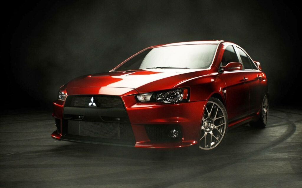 Stunning Red Mitsubishi Lancer Wallpaper: Elegance & Power Unleashed