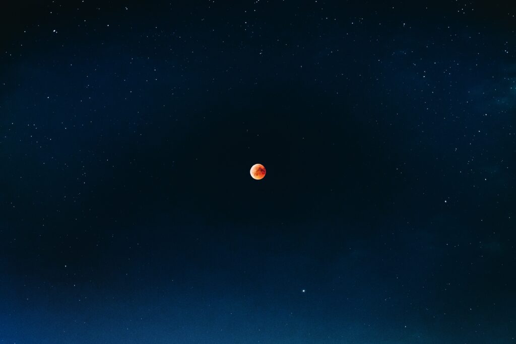 Stunning Red Moon Eclipse Wallpaper Over Starry Night Sky