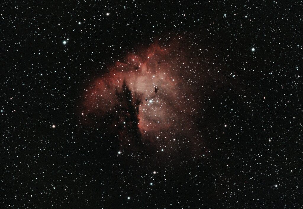 Stunning Red Nebula Wallpaper: Explore Deep Space's Vast Mystery