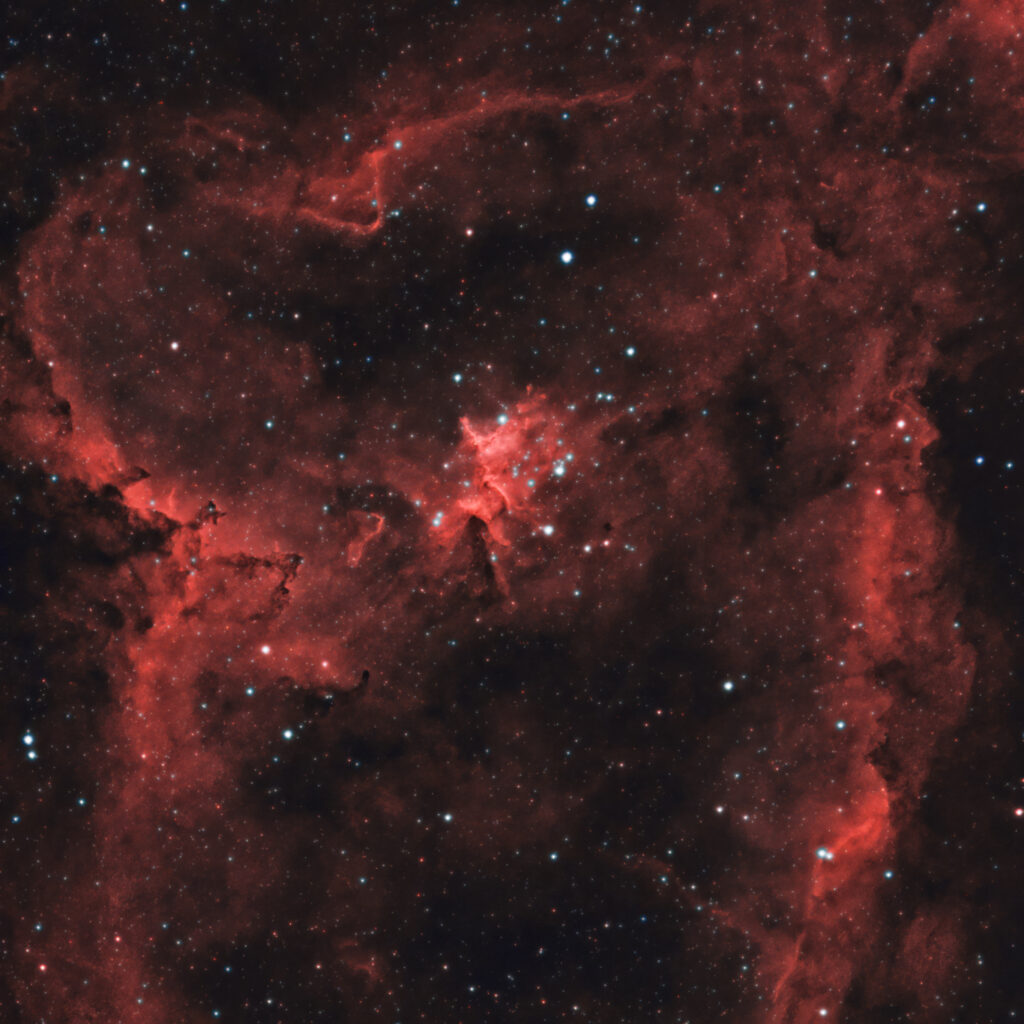 Stunning Red Nebula Wallpaper: Vibrant Cosmic Scene Among Stars