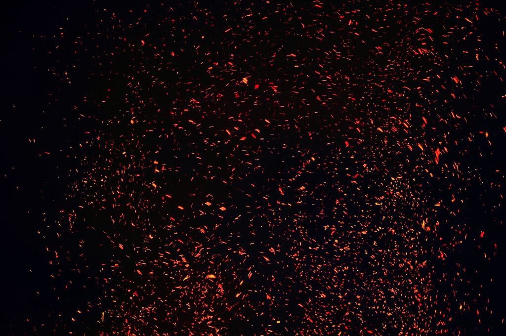 Stunning Red-Orange Sparks Abstract Wallpaper on Dark Background