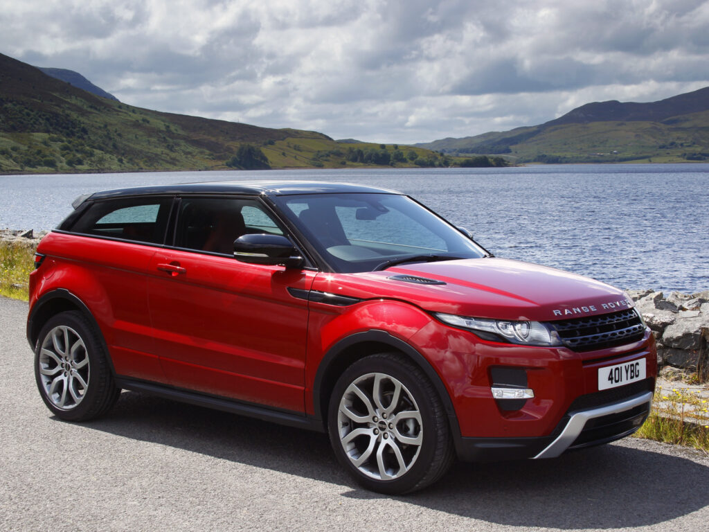 Elegant Red Range Rover Evoque by Scenic Lakeside - Stunning View Wallpaper