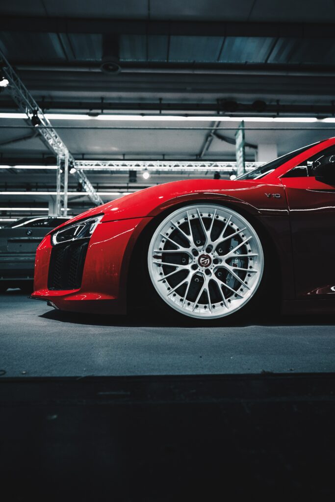 Stunning Red Sports Car Wallpaper - Sleek Design & Dynamic Look
